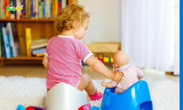 Hướng dẫn trẻ làm quen với việc ngồi bô đi vệ sinh